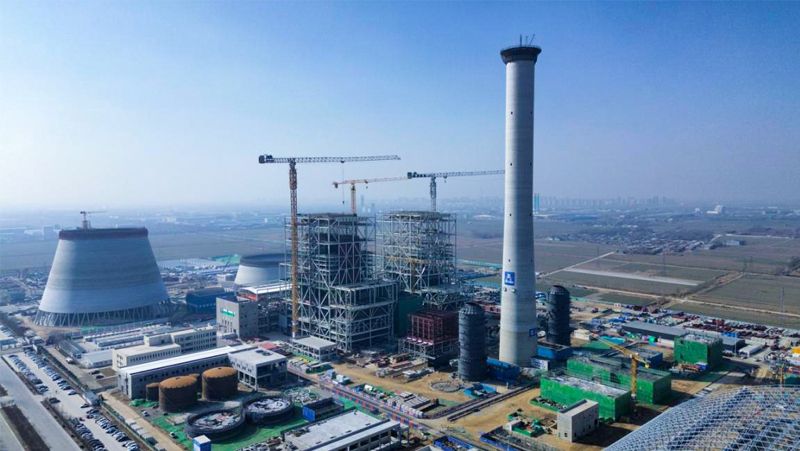山東能源聊城祥光2×66萬千瓦熱電聯(lián)產(chǎn)項目煙囪外筒順利封頂